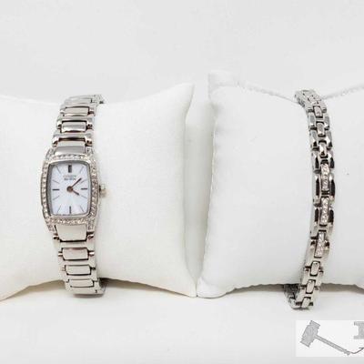 585: Ladies Citizen Eco-Drive Watch with Accent Bracelet in Box
Includes Hard case and original box.
Measures approx 20mm 

OS12-023563.2...