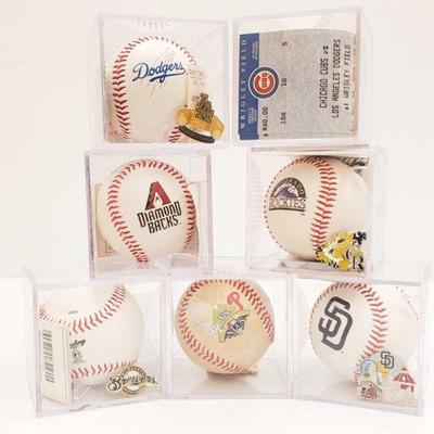 1401: 7 Collectors Baseballs
Including teams Dodgers, Cubs, Diamond Backs, Rockies, Brewers, and Padres.