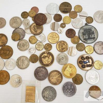 1192: Various Coins, Tokens, and Metals
This collection includes a Abraham Lincoln memorial coin, Wells Fargo 150'th anniversary coin,...