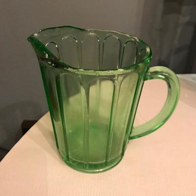 Green depression glass pitcher