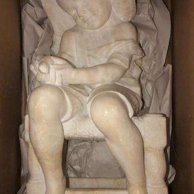 Seated alabaster child 