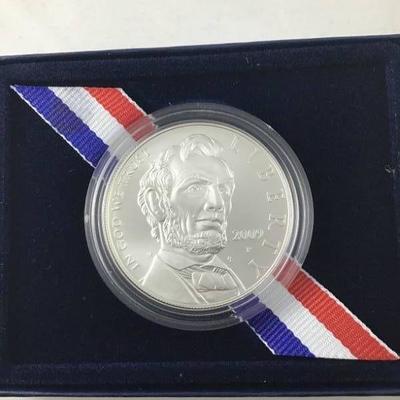 2009 Abraham Lincoln commemorative silver dollar p ...