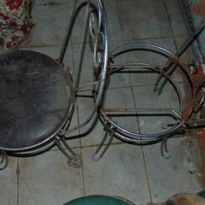 2 metal frame chairs