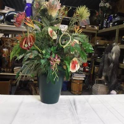 Green matte finish vase with fake flowers
