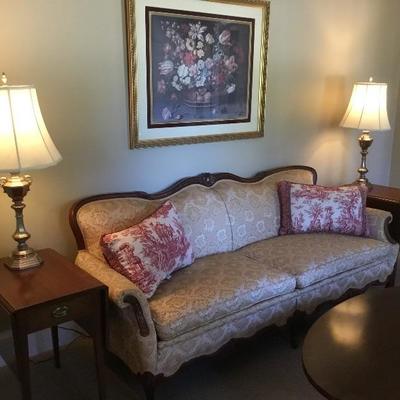 Vintage mahogany drop-leaf end tables, victorian style sofa, artwork and lamps