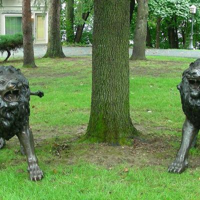 Pair Life Size Bronze Sculptures of Lions