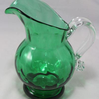 Blown glass green pitcher with clear applied handle (7 1/2” H)