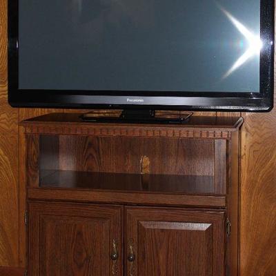 Panasonic 2011 42” Smart TV shown with TV/Microwave Stand 