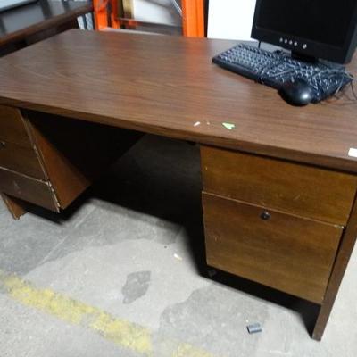 Solid wood executive desk.