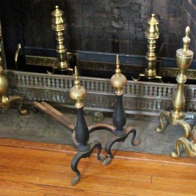 collection of fire screens, fenders, fire basket, andirons, fire starter, bellows, and brooms