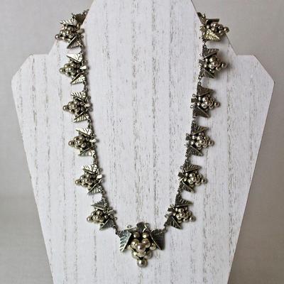 sterling silver and costume jewelry collection, including this grape cluster necklace in sterling silver