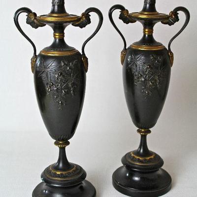 pair of solid metal decorative urns