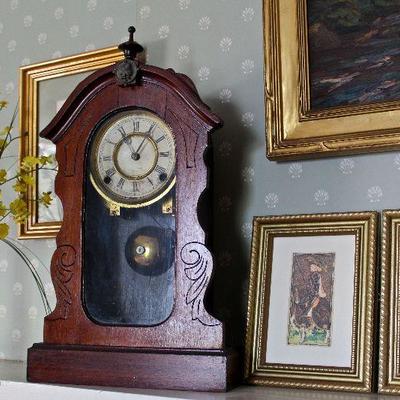 mantle clock and framed prints