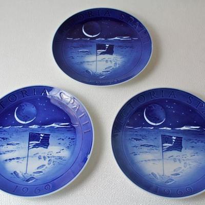 Royal Copenhagen commemorative plates, including 1969 moon landing and annual Christmas editions