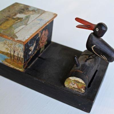 folk art cigarette dispenser with exquisitely painted storage box