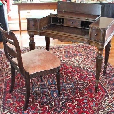small desk with folding top, chair with upholstered seat, Oriental rug