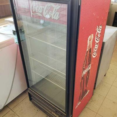 5015: Coca-Cola True Refrigerator Model GDM-10
Measures approximately 53.5