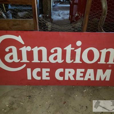 1253: Carnation Ice Cream Steel Sign with Wood Frame
Measures approximately 28.5