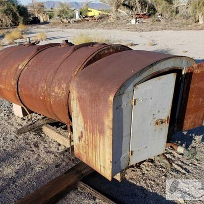 1015: Antique Tank with Storage Cabinet
Measures approximately 3' x 93