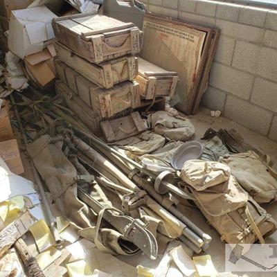 2706: Lot of Military Equipment
Includes Poles, Jerry Can, Ammo Boxes, travel bags