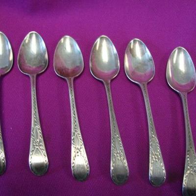 Six Sterling
demitasse spoons signed Hester Bateman