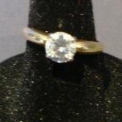 14K yellow gold and diamond solitaire, 80 pts.