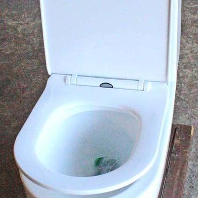  NEW â€œHigh Seatâ€ Porcelain Top Flush Toilet

Auction Estimate $100-$300 â€“ Located Inside 