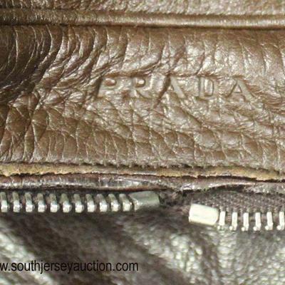  Brown Leather â€œPradaâ€ Purse Made in Italy

Auction Estimate $100-$300 â€“ Located Glassware 