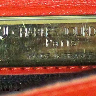  â€œCharles Jourdanâ€ Paris Red Leather Purse Made in France with Dust Bag

Auction Estimate $100-$300 â€“ Located Glassware 