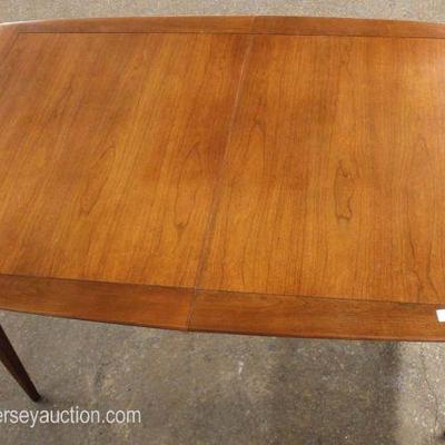  Mid Century Modern Danish Walnut Inlaid Dining Room Table with 3 Leaves and 4 Chairs

Auction Estimate $200-$400 â€“ Located Inside 