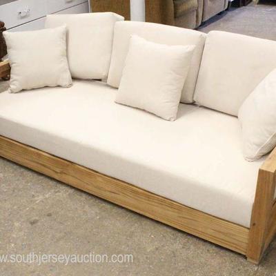  NEW â€œSafavieh Furnitureâ€ Modern Design Wood Frame Sofa with Pillows

Auction Estimate $300-$600 â€“ Located Inside 