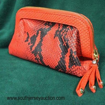  â€œHenri Bendelâ€ Red and Black Snake Skin Clutch Bag

Auction Estimate $50-$100 â€“ Located Glassware 