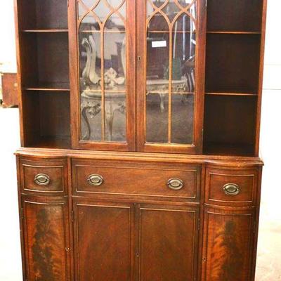  Burl Mahogany â€œMaddox Furnitureâ€ 6 Door 2 Drawer China Cabinet Breakfront with Desk and Bookcase Sides

Auction Estimate $300-$600...