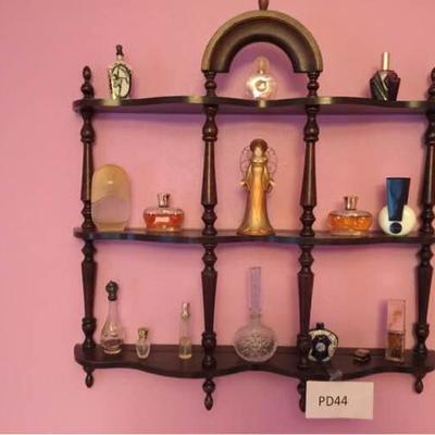 Perfume Bottles on Knick Knack Shelf