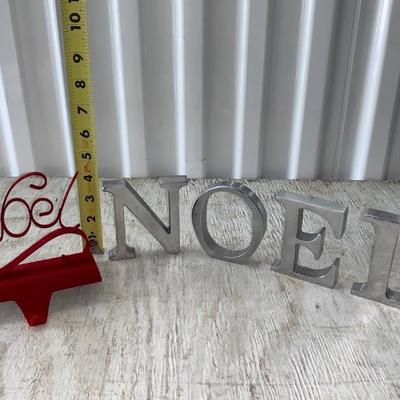 Noel stocking holder and Silver letters. 
View all 100+ lots at https://texastauctions.com