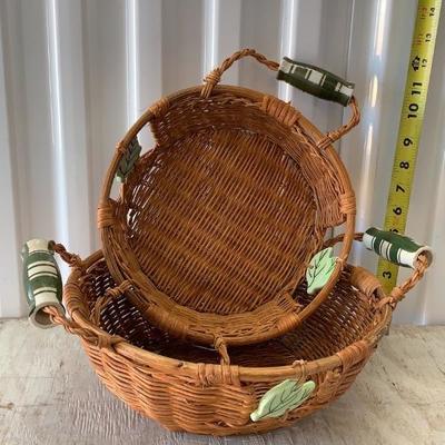 Baskets with porcelain handles and inserts. 
View all 100+ lots at https://texastauctions.com