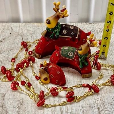 Nesting Deer with garland. 
View all 100+ lots at https://texastauctions.com