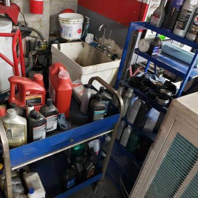 989: Roll Cart and Shelving Unit with Oil Filter Wrenches
Roll Cart and Shelving Unit with Oil Filter Wrenches