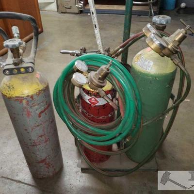 711: Oxy and Acetylene Tanks, Victor Torches, Blue Point Guages, and Tank Dolly
Oxy and Acetylene Tanks, Victor Torches, Blue Point...