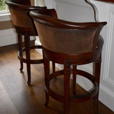 Pair of leather swivel bar stools