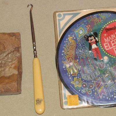 Mickey's main street Electric parade record, fossilized fish in rock