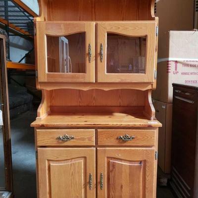 Wooden Hutch
This Hutch comes with two drawers and cabinets along with a good place to write. Aprox 71x36in