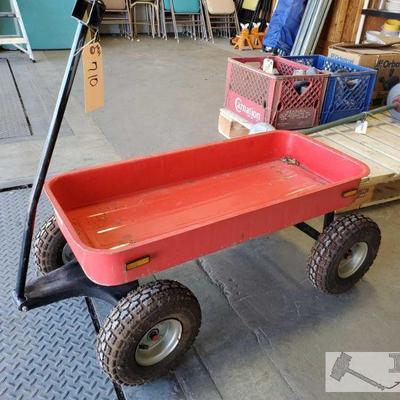 710: Red Pull Wagon
Has swivel front end for turns. Measures approx. 39