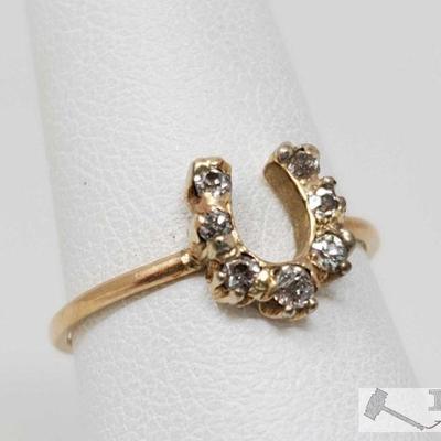 106: 14k Gold Horseshoe Diamond Ring, 1.2g
Weighs approx 1.2g, approx size 6 
J13 3 of 5