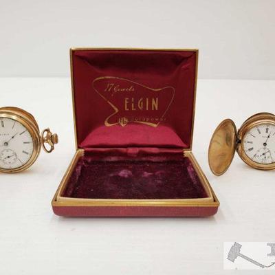 254: Two Pocket Watches
This collection contains two pocket watches made by Elgin and Waltham. Case included 
J14 1 of 2
