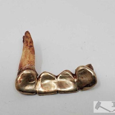 120: 14k Gold Teeth, 5.9g
Weighs approx 5.9g 
J1
