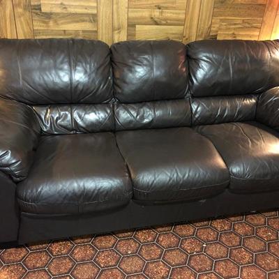 Chocolate brown leather sofa
$320