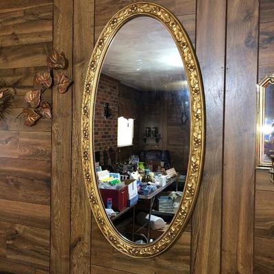Heavy Gold framed oval mirror
$28