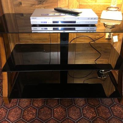 Black glass and wood frame TV stand w/3 shelves
$50