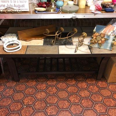 Wrought iron tile-top coffee table
$75